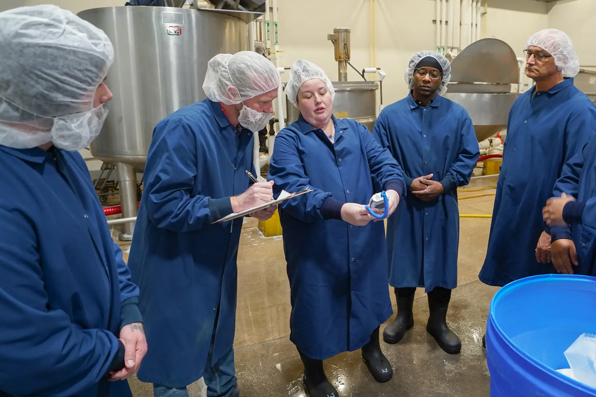 Larissa Jackson working with a food manufacturing team during a facility review