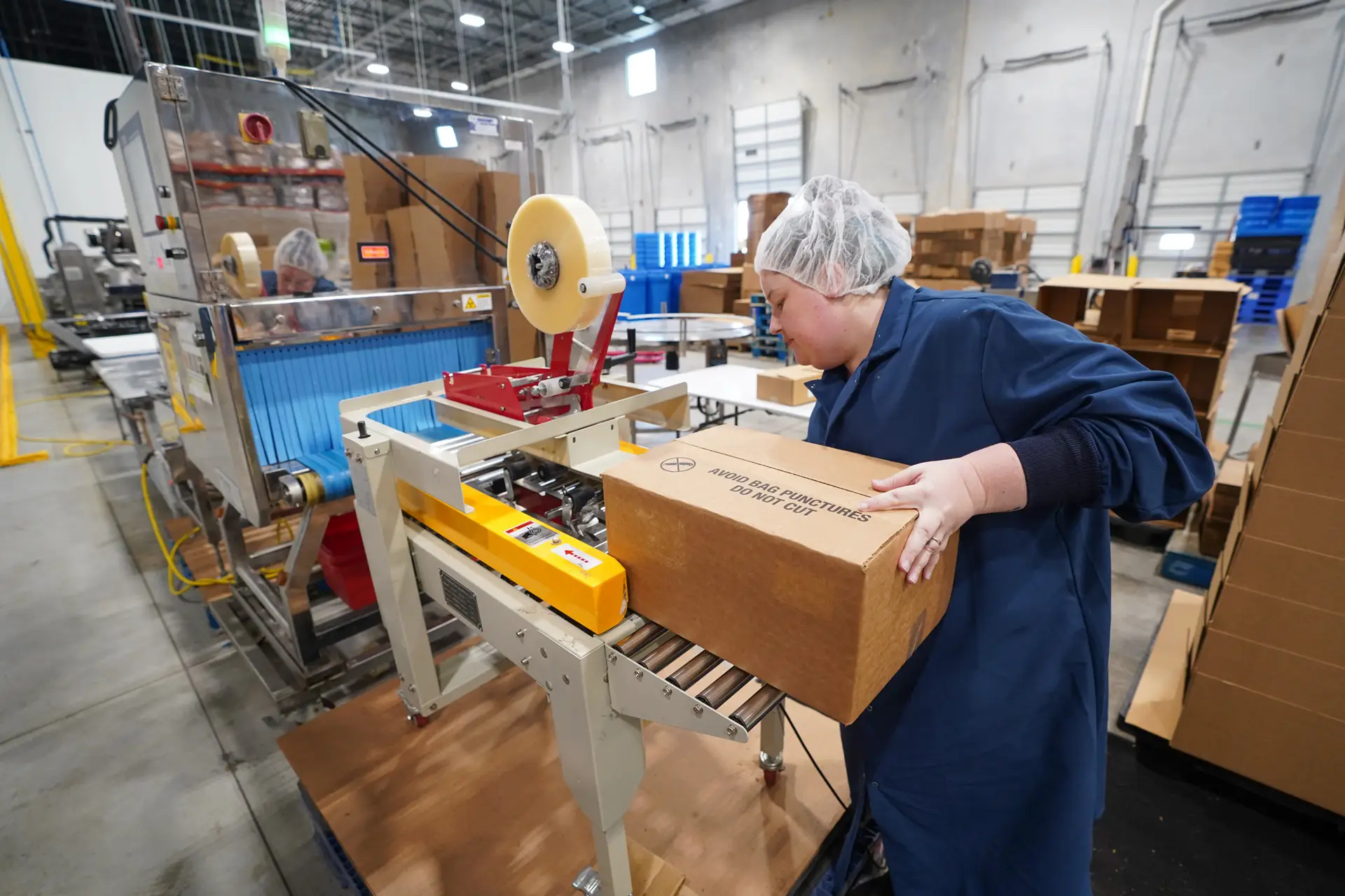 Quality assurance specialist calibrating X-ray inspection equipment